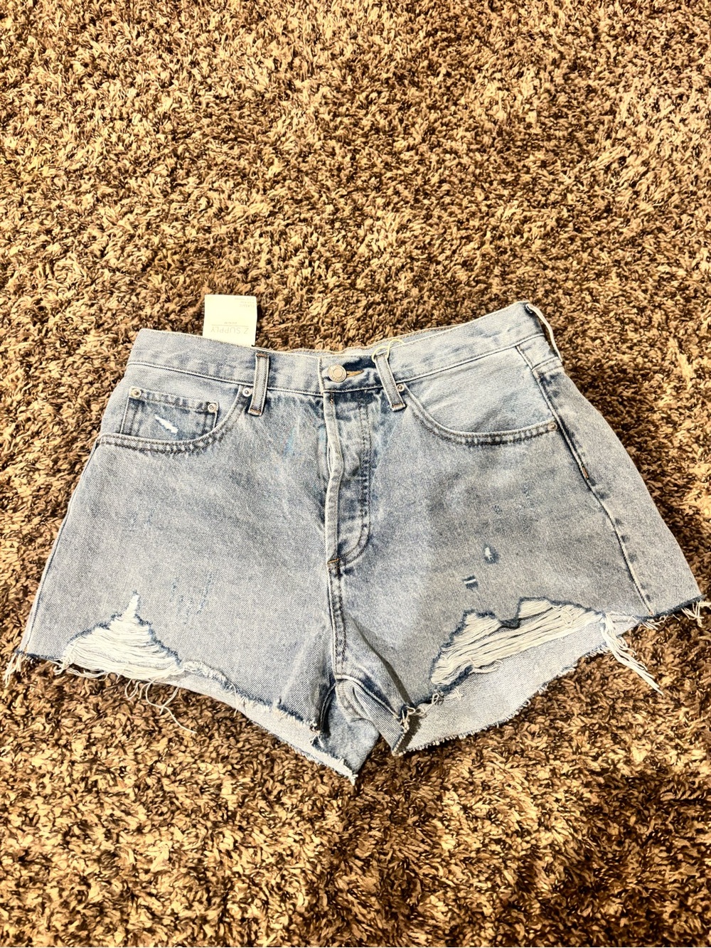 High-Rise Light Blue Distressed Denim Shorts